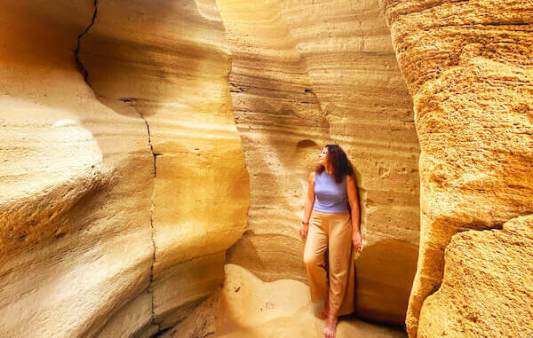 Quad biking tour with a stop at the scenic canyon in Timlalalin near Agadir, surrounded by dramatic rock formations and sand dunes.