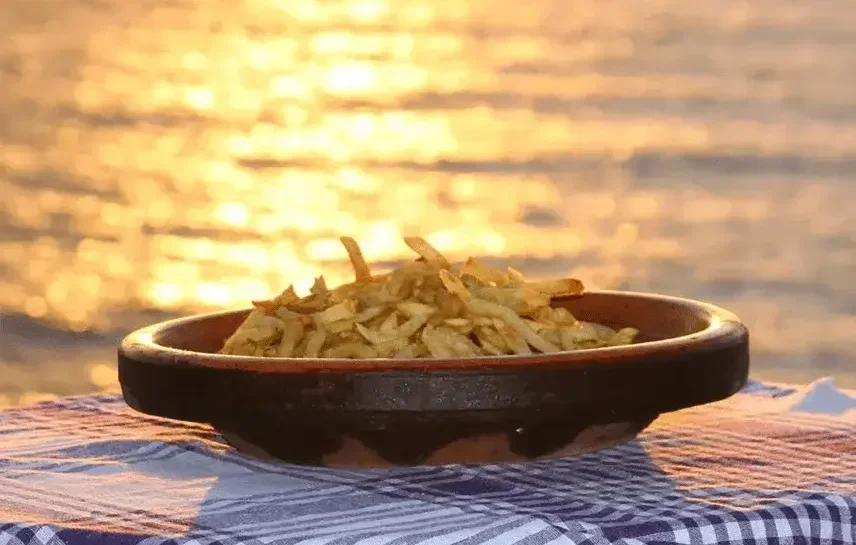 Traditional Moroccan tagine served during a Timlalin Dunes dinner experience