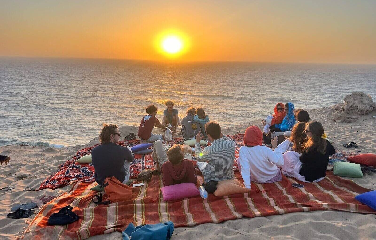 Guests enjoying sunset dinner in Timlalin Dunes overlooking the Atlantic Ocean