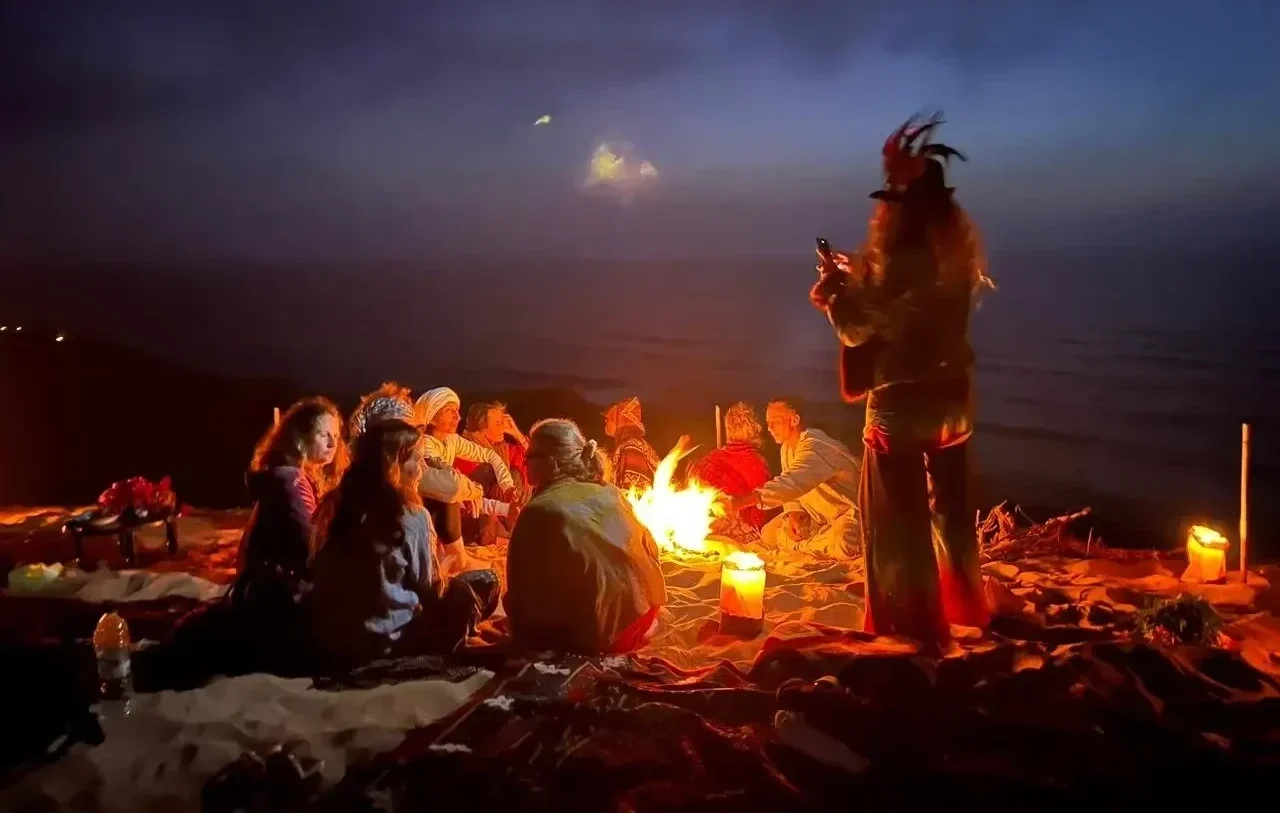 Dinner in Timlalin Dunes with a traditional Moroccan setup at sunset near Agadir